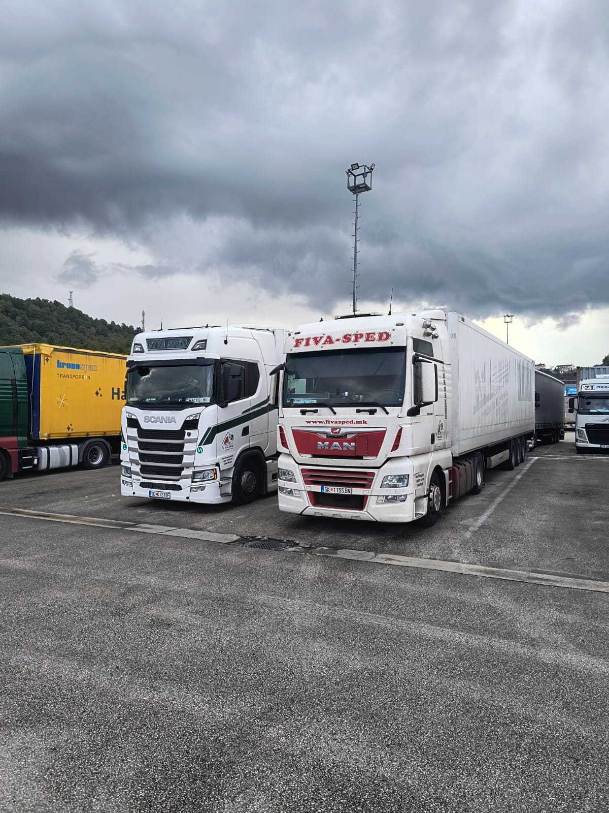 Fiva-Sped Scania and MAN at a truck stop